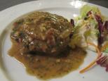 Veal steak with porchini mushrooms — at Trattoria Fori Porta in Siena