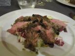 Cuts of beef with mixed herbs — at Trattoria Fori Porta, Siena.