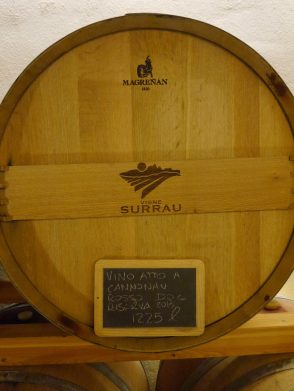 Oak barrel with Cannonau (Sardinian name for Grenache/Garnacha) ageing inside