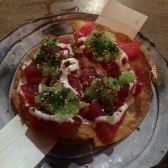 Tuna Sashimi Pizza with Truffle Ponzu, Red Onions and Green Chillies