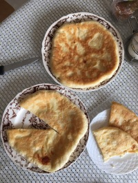 Not Azerbaijani but Georgian Khachapuri - dough filled with cheese. This is one of my guiltiest pleasures.