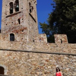 A church in the town of Castagnetto Carducci. And the lady in red would be me :)